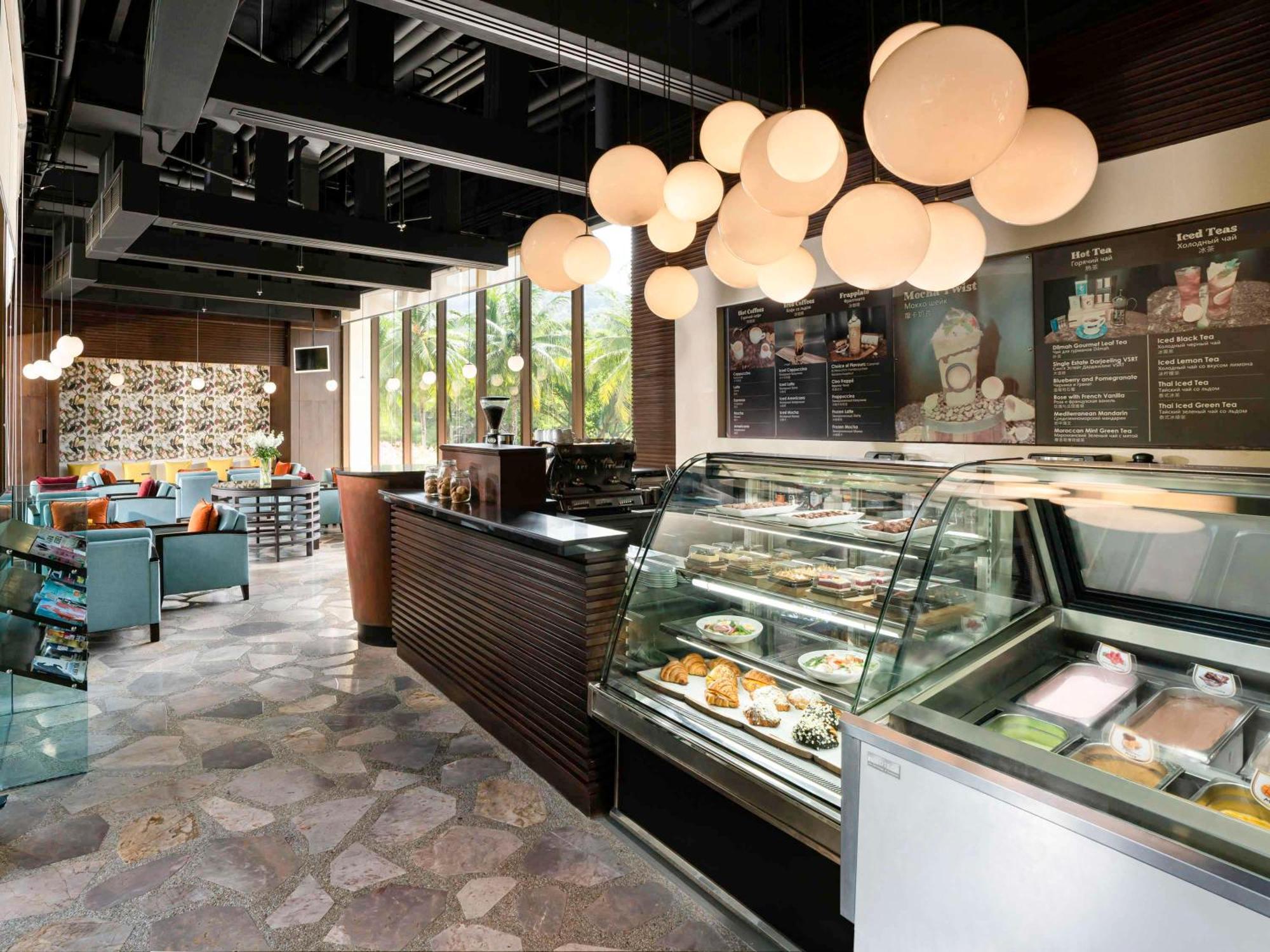 Pullman Phuket Karon Beach Resort Esterno foto The interior of a Starbucks Reserve store in Seattle, Washington