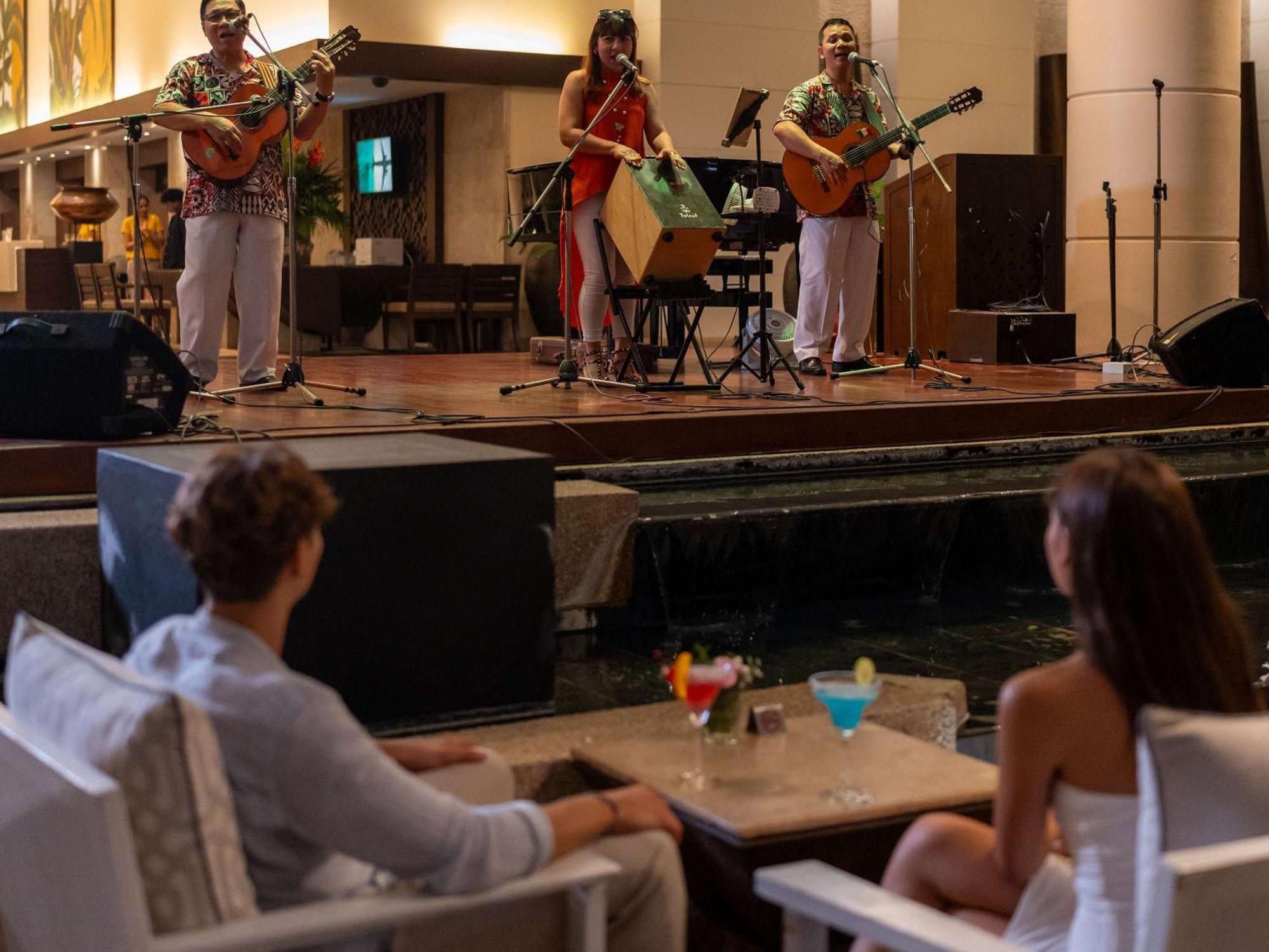 Pullman Phuket Karon Beach Resort Esterno foto Live music at the lobby